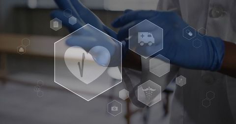 Healthcare Professional Putting on Gloves with Digital Medical Icons
