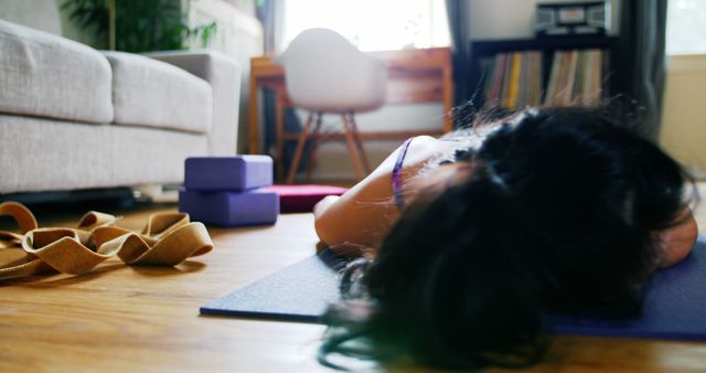 Woman Relaxing on Yoga Mat at Home with Yoga Props Nearby - Download Free Stock Images Pikwizard.com