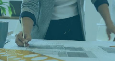 Focused Businesswoman Designing in Modern Office