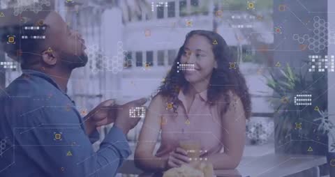 Joyful Couple at Cafe with Digital Interface Overlay Concept