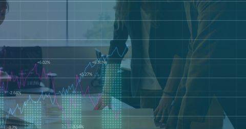 Business Professionals Analyzing Financial Trends in Office Setting - Download Free Stock Images Pikwizard.com