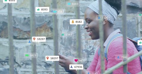 African American Woman Engaging with Digital Media in an Urban Setting