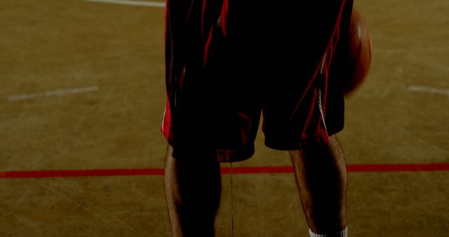 Athlete dribbling basketball on indoor court - Download Free Stock Images Pikwizard.com