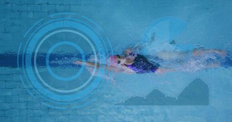 Dynamic swim movement of female athlete in minimalist lap pool