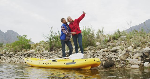 Couple Posing for Selfie While Kayaking on River - Download Free Stock Photos Pikwizard.com