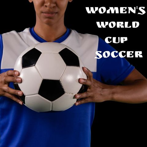 Female athlete holding soccer ball focused on game