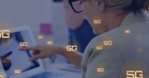 Business professional with digital 5g concept overlay