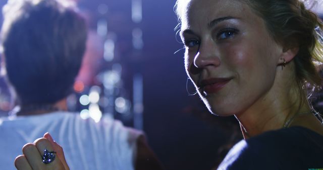 Woman Enjoying Night Out at Concert with a Friend - Download Free Stock Images Pikwizard.com