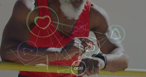 Senior Man Innovating Fitness with Smartwatch and Digital Connections