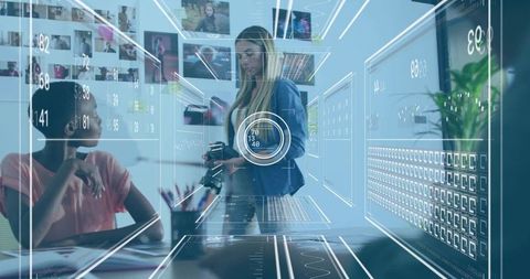 Businesswoman Analyzing Futuristic Holographic Data Charts in Creative Office