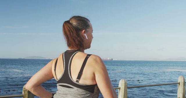 Healthy Lifestyle - Woman Jogging Along Seaside Promenade - Download Free Stock Images Pikwizard.com