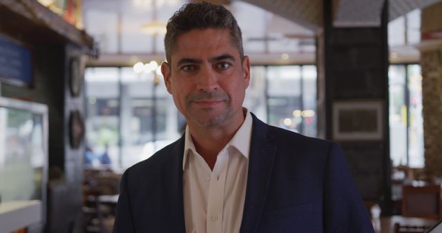 Confident Businessman in Restaurant Wearing Blue Suit - Download Free Stock Images Pikwizard.com