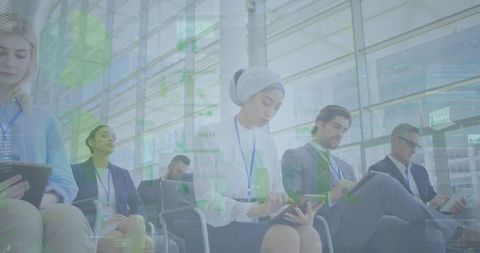 Business Experts Analyzing Statistics at Conference