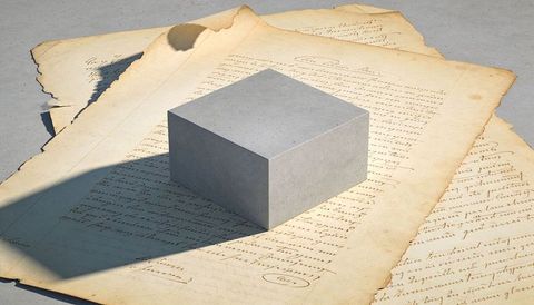 Concrete cube casting long shadow over vintage calligraphy on aged parchment