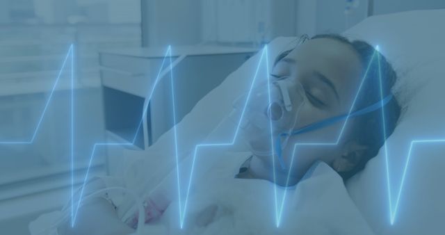 Young patient lying in hospital bed with oxygen mask and visible electrocardiogram lines in foreground. Ideal for healthcare, pediatric care, hospital, medical technology, and patient recovery themed uses.