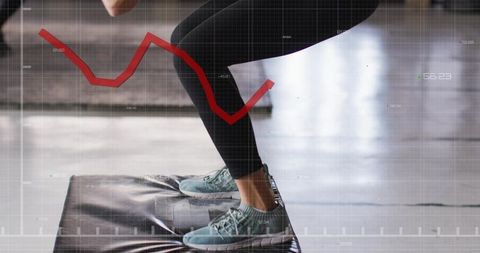 Athlete jumping on plyometric box with data overlay showing performance metrics