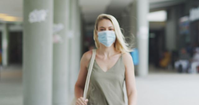 Young Woman Wearing Protective Mask Outdoors - Download Free Stock Images Pikwizard.com