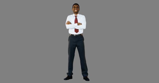 Smiling African American Businessman with Arms Crossed - Download Free Stock Images Pikwizard.com