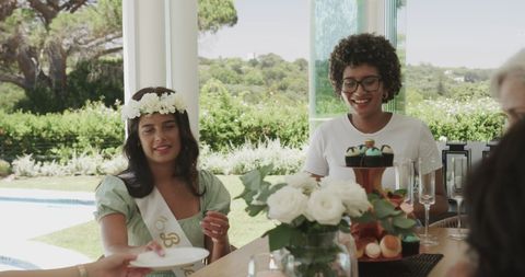 Bride-to-Be Celebrating with Friends at Outdoor Engagement Party