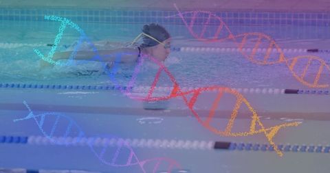 Swimmer in Butterfly Stroke with DNA Overlay at Indoor Pool