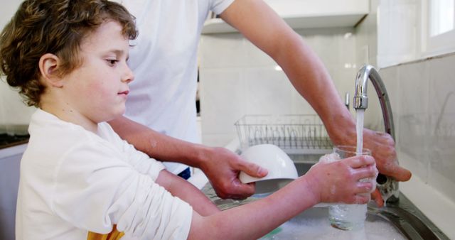 Father and Son Washing Dishes in Kitchen Sink - Download Free Stock Images Pikwizard.com