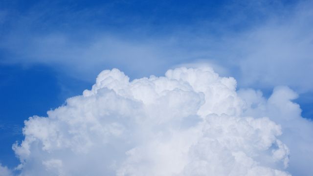 Fluffy White Clouds Against Clear Blue Sky - Download Free Stock Photos Pikwizard.com