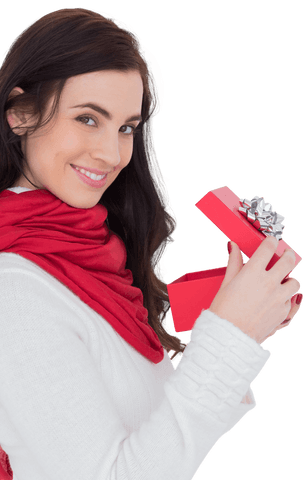 Smiling brunette opening red gift box with silver ribbon, transparent