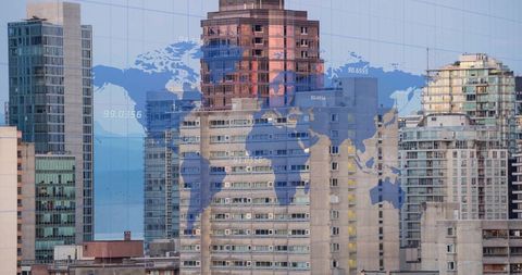 Global finance concepts with world map superimposed on cityscape