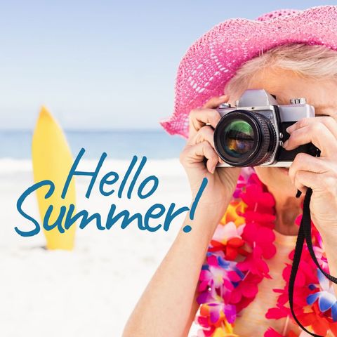 Senior woman embracing summer fun at beach
