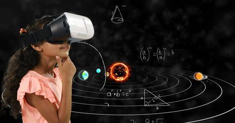 Girl exploring solar system and math equations with vr