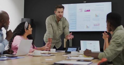 Professional Team Engaged in Strategic Business Presentation