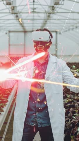Scientist Wearing VR Headset Exploring Smart Greenhouse, Engaging Virtual Lightbulb — Vertical Video
