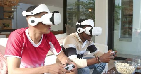 Men Immersed in Virtual Reality Gaming at Home
