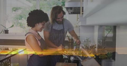 Couple Enjoys Cooking Together in Warm Sunset Kitchen