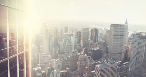 Metropolis Skyline Bathed in Golden Sunlight - Download Free Stock Images Pikwizard.com