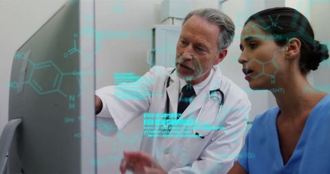 Doctors collaborating on digital medical data analysis