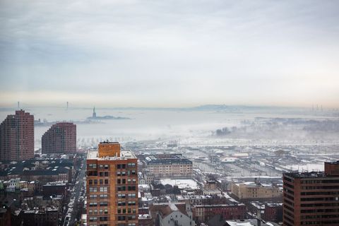 Winter morning over foggy new jersey with distant skyline