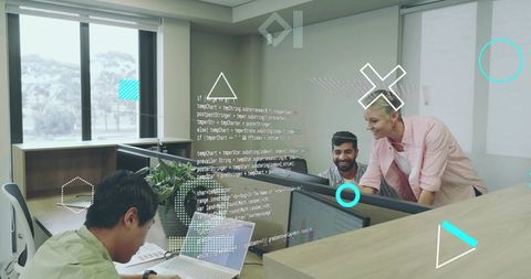 Innovative software development team analyzing code together in modern workspace