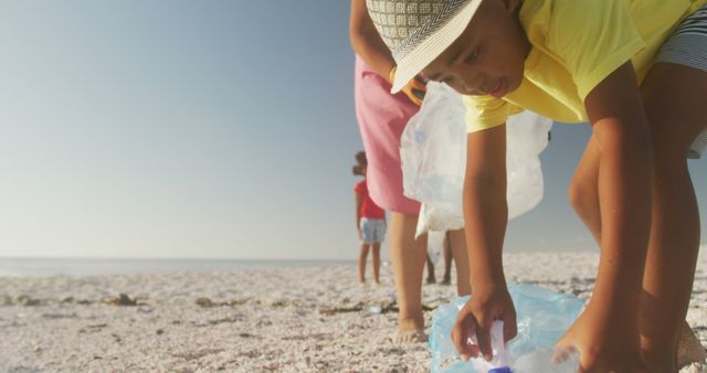 Kids Participating in Beach Cleanup Collecting Plastic Bottles - Download Free Stock Images Pikwizard.com