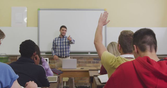 Teacher Engaging Classroom with Interactive Discussion - Download Free Stock Images Pikwizard.com