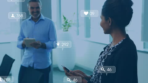 Business Executives Engaging with Digital Technology in Office