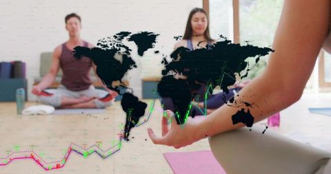 Meditating group holding mudra while world map and market charts overlay
