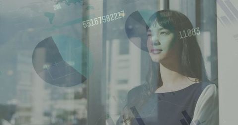 Businesswoman Analyzing Virtual Data in Modern Office