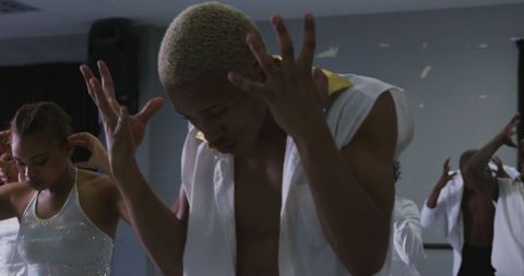 Energetic dancers rehearsing for performance with zeal