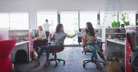 Two Businesswomen Collaborative Meeting in Modern Office