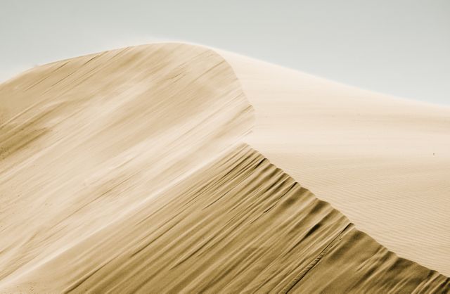 Serene Sand Dune Landscape with Gentle Winds - Download Free Stock Photos Pikwizard.com
