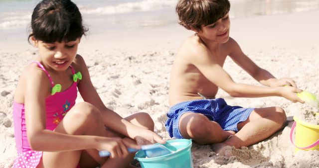 Children Playing in the Sand at the Beach - Download Free Stock Images Pikwizard.com