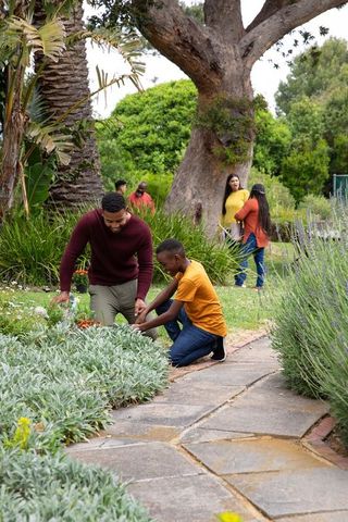 Family togetherness in community garden outdoor activity