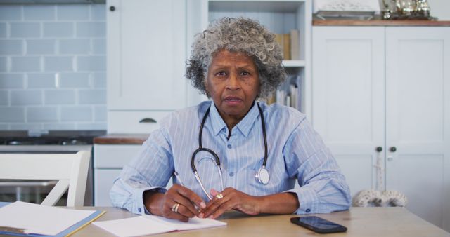 Elderly Female Doctor Discussing Patient Case at Clinic - Download Free Stock Images Pikwizard.com