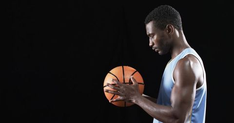 Focused Basketball Player Preparing for Intense Game - Download Free Stock Images Pikwizard.com